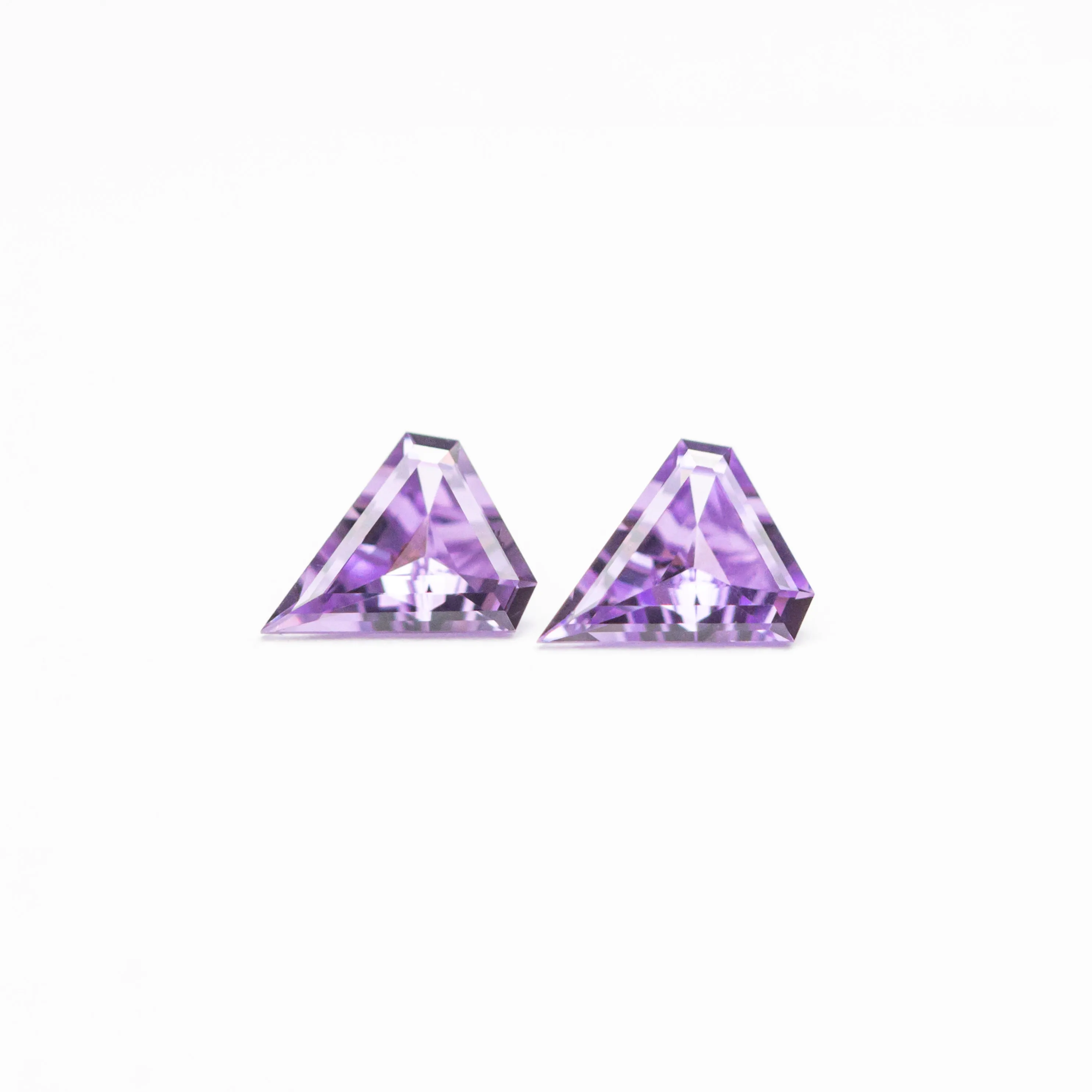 0.25cttw 2pc 4.03x3.50x1.66mm 4.04x3.53x1.62mm Shield Step Cut Sapphire Matching Pair 22797-01