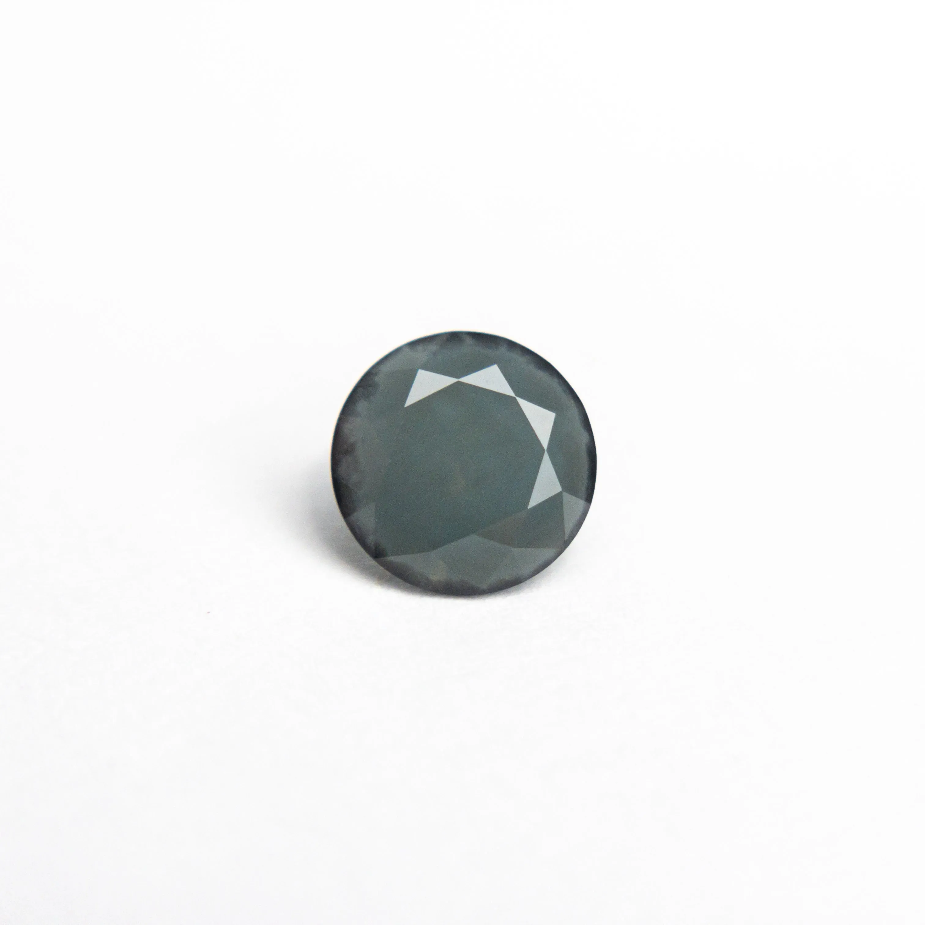 0.61ct 5.29x5.28x3.14mm Round Brilliant Sapphire 22099-06