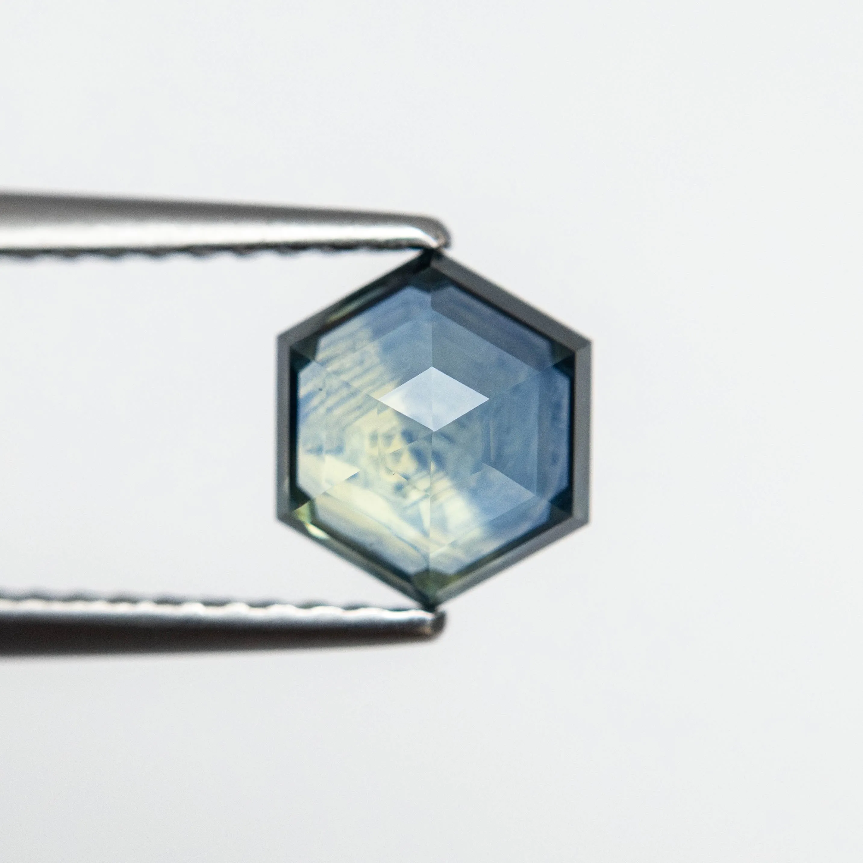 1.21ct 6.88x6.03x3.21mm Hexagon Step Cut Sapphire 23088-08